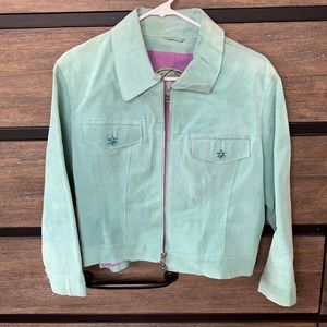 Wilson’s Leather green jacket with blue rhinestone flower accents